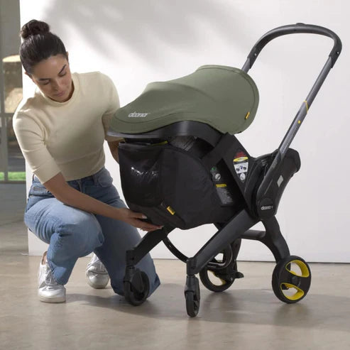 Coche y silla de auto Doona+ Blue + Bolso de almacenamiento Doona
